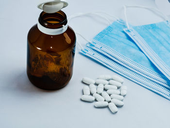 High angle view of bottles on table