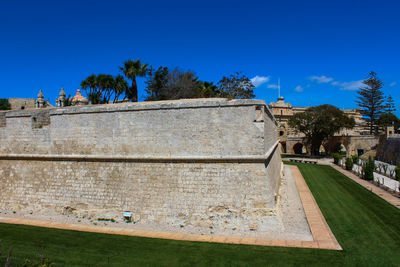 Built structure against clear blue sky