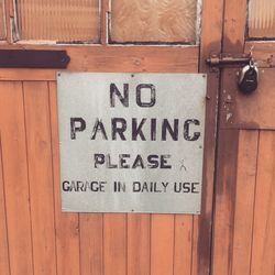 Close-up of text on wood