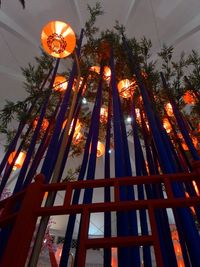 Low angle view of illuminated lighting equipment