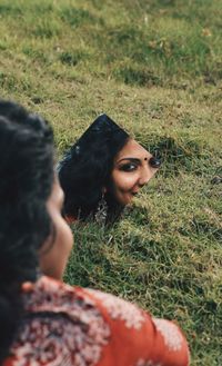 Portrait of woman on field