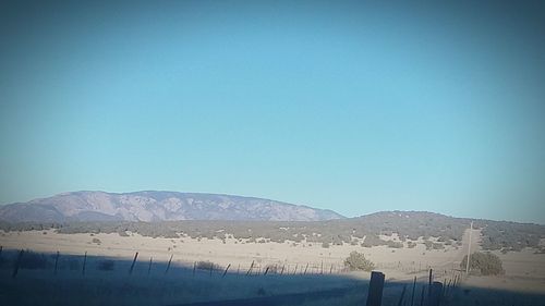 Scenic view of mountains against clear sky