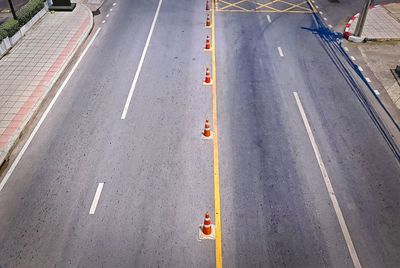 High angle view of traffic cones on road