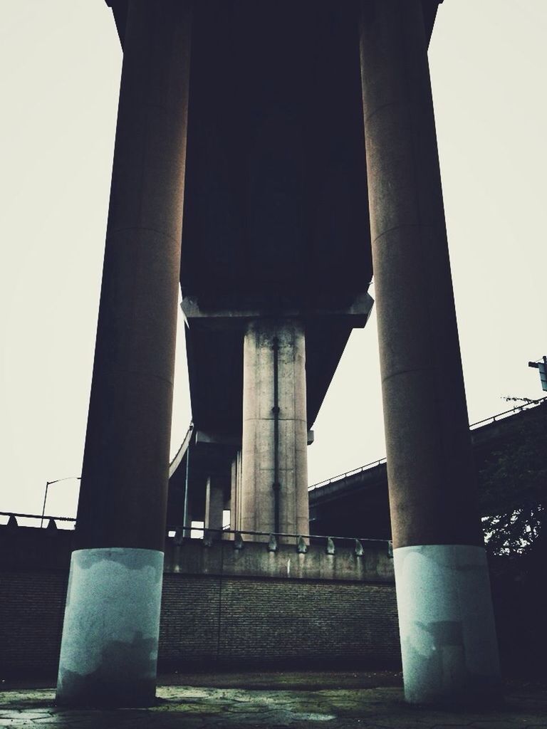 architecture, built structure, architectural column, column, bridge - man made structure, low angle view, engineering, connection, history, famous place, clear sky, travel destinations, international landmark, building exterior, support, travel, tourism, capital cities, transportation, pillar