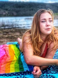 Portrait of a beautiful young woman at beach