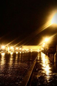 Illuminated street lights at night