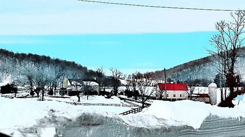 Scenic view of snow covered landscape