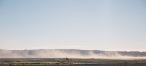 Panoramic view of mojave desert against clear sky