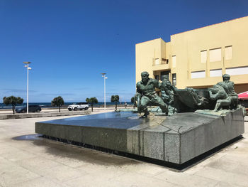 Statue of fountain in city