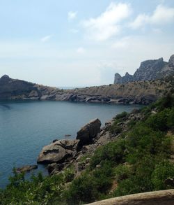 Scenic view of bay against sky