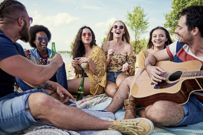 Group of people playing guitar