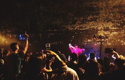 People enjoying at concert