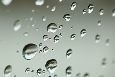 Close-up of water drops on glass