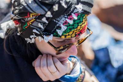 Close-up of woman holding hands