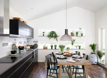 Modern kitchen with dining table