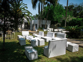 View of cemetery against plants in yard