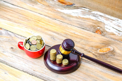 High angle view of coins on table