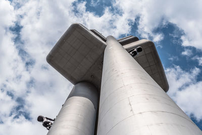 Low angle view of factory against sky