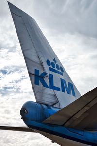 Low angle view of airplane against sky
