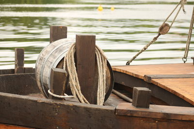 Close-up of wooden posts in water