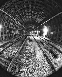 Railroad tracks in tunnel