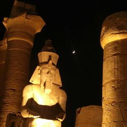 Low angle view of statue at night