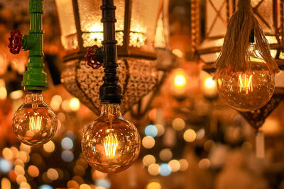 Close-up of illuminated lights bulbs