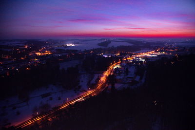 High angle view of illuminated cityscape at night