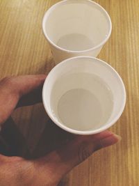 High angle view of coffee cup on table