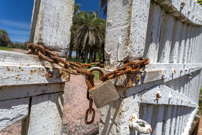 Close-up of padlock on fence