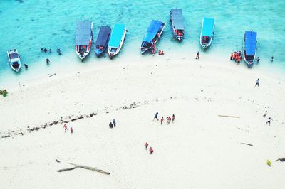 High angle view of boats moored at beach