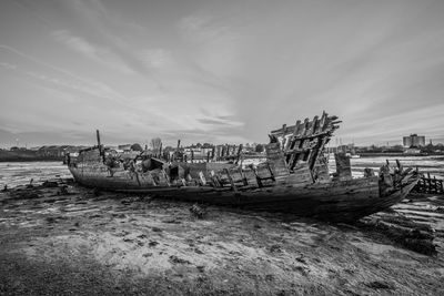 Old ruins of boat at beach