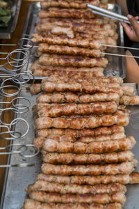 Full frame shot of meat on barbecue grill