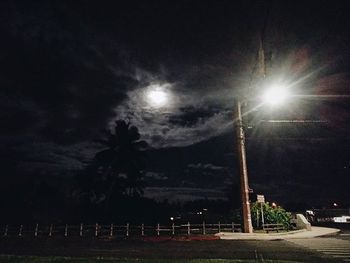 Illuminated street light at night