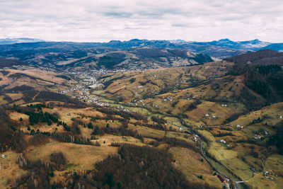 High angle view of valley against sky