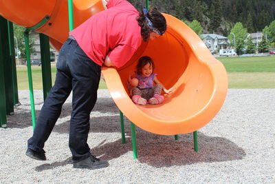 Rear view of children playing