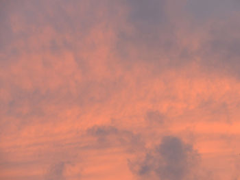 Low angle view of orange cloudy sky