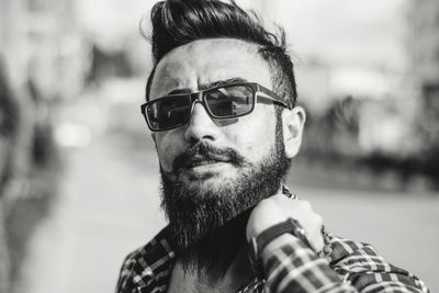 Close-up of young man wearing sunglasses