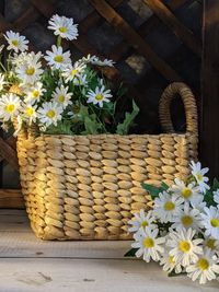 A handmade basket with flowers 