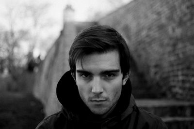 Close-up portrait of serious young man