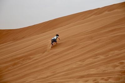 People riding in desert