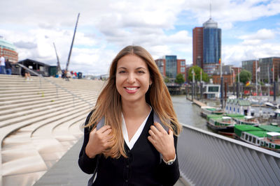 Beautiful school exchange girl visiting northern europe within the exchange program. looks at camera