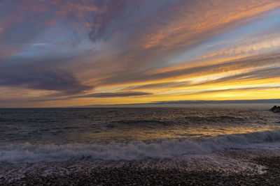 Scenic view of sea against sky during sunset