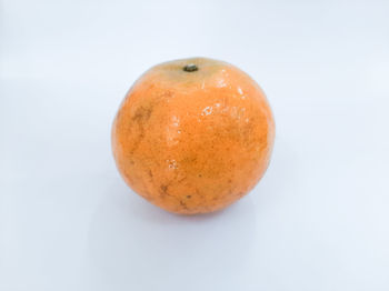 High angle view of apple against white background