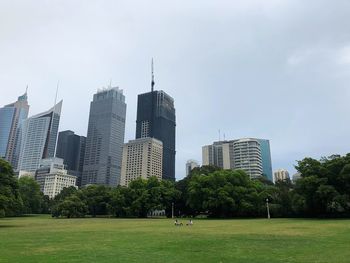 Buildings in city against sky