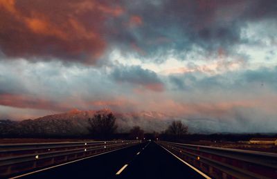 Road against sky during sunset