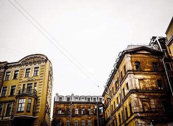 Low angle view of buildings against clear sky