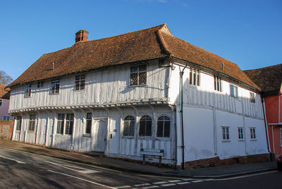 Exterior of old building against clear blue sky