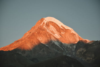 View of mountain range against clear sky