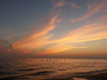 Scenic view of sea at sunset